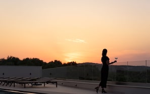Enjoy drinks at sunset on your private roof terrace overlooking the sea.
