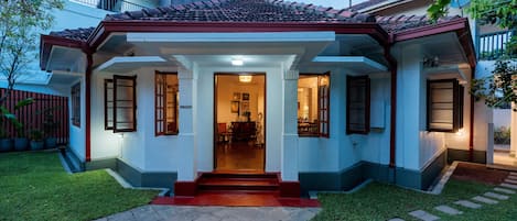 House main entrance and frontage with garden