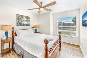 Queen bed with TV and drawers in closet for storing your clothes