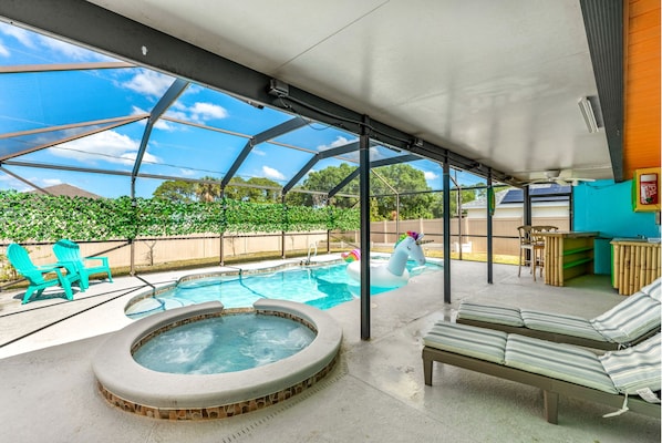 Pool and hot tub inside a pool enclosure. Send us a message for hot tub hours