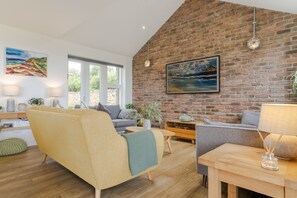 Polberro Cottage, Ground Floor: Sitting area with three stylish sofas