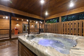 Unwind in style with our After the Sunset's luxurious hot tub on the patio.