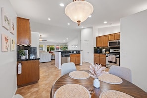 Additional dining area with view of the kitchen and living room