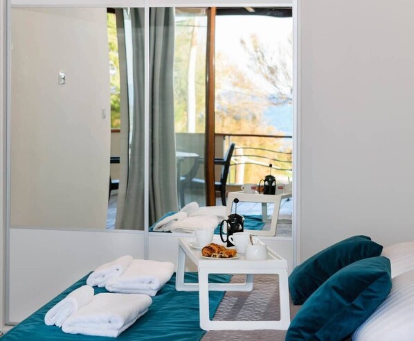 Bright bedroom. Relax in your bed and enjoy the view.
