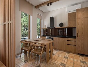 Bright and comfortable kitchen in earthy colours, provides you with everything you need for a complete stay. Don't forget to enjoy the nespresso machine.