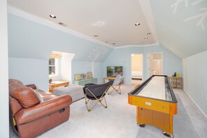  TV/game room with 12 foot shuffle board table