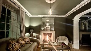 Drawing Room with inviting log fire for wintery evenings 