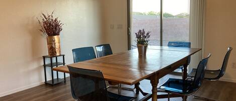 Dining area with sliding glass dose access to patio and back yard