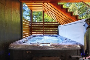 Unwind in our luxurious oversized hot tub with seating for 8. This space is conveniently located on the covered main deck and promises ultimate relaxation and unforgettable moments.