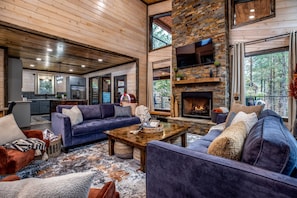 Welcome to our open-concept living and dining area! Enjoy a spacious, inviting atmosphere with large windows and natural light. The kitchen is just steps away, perfect for entertaining or family gatherings. Modern design and easy flow between spaces await.