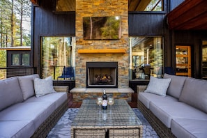 Gather the family for cozy evenings! Enjoy quality time on plush sofas, a warm gas fireplace, and a 55" Smart TV perfect for streaming your favorite movies. Grab a cup of coffee or glass of wine and create unforgettable memories together