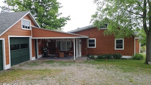 covered porch at entry off of driveway