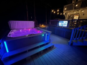 Salt water hot tub and outdoor flatscreen television