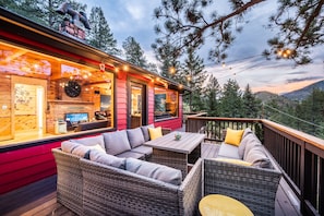 upper deck with outdoor seating and dinning space.