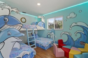 The Dolphin Tail Bunk Room | 3 Twin Beds