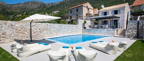 Lounge area by the pool to relax.