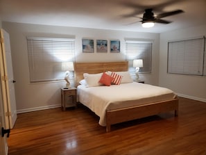 Master bedroom with king bed, large walk-in closet, master bath & smart tv. 
