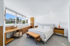 Master Bedroom with king size bed, attached mater bathroom, and walk-in closet