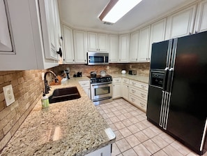 Luxury kitchen equipped for all your cooking needs.