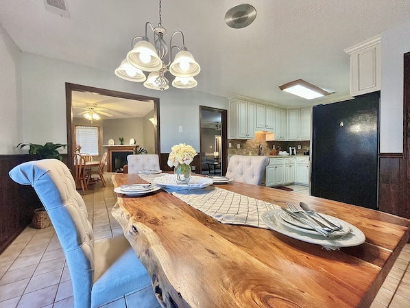 Lovely wood cut dining table for more intimate meals.