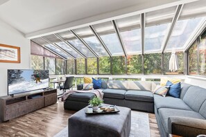 Sunroom addition adds  tons of natural light to the great room
