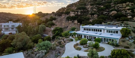 The house sits at the top of the Santa Susana Mountains at the end of a private road.