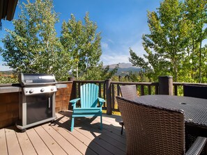 Large deck off of the living room with gas grill 