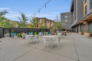 Located on the first floor of the building is the modern outdoor sitting area with outdoor fireplaces and gorgeous views over the Canyons Resort base area.