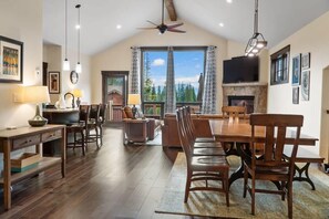 The shared living space is the perfect spot to relax with your group whether you are hanging by the fireplace or enjoying the mountain views from the balcony.