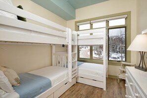 The second bedroom offers two sets of twin bunks.