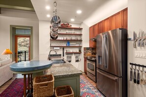 The kitchen is fully stocked with everything you need to enjoy dining at home during your vacation in Snowmass