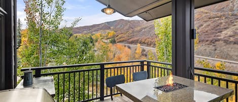 Year round you will enjoy relaxing on the covered deck while enjoying a beverage.