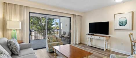 Living room with flat screen TV and sleeper queen sofa