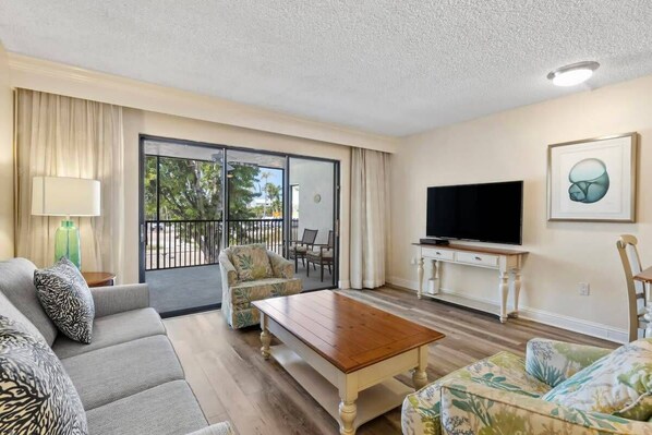 Living room with flat screen TV and sleeper queen sofa