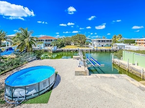 Canal Hone with boat ramp and pool (1 of 12)