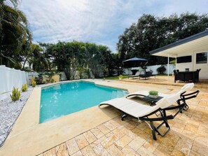 Sun, Swim, Repeat: Make a splash in your private pool or bask in the sun on comfortable loungers.