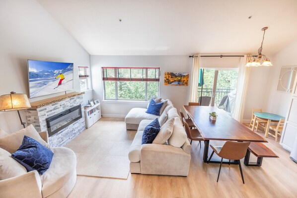 Living area with electric fireplace & Smart TV