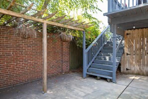 Stair entrance to balcony and unit