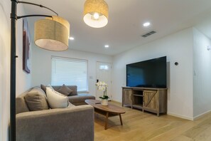 Living room with 75" TV