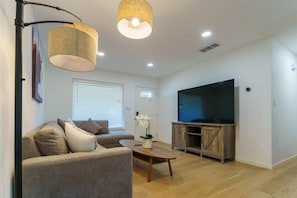 Living room with 75" TV