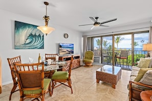 Living room is spacious with lots of windows to take in the views.