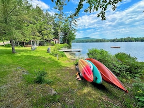 Waterfront area offers seating, a screened porch, dock, swim platform and several different boating options!