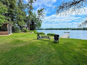 Waterfront area offers seating, a screened porch, dock, swim platform and several different boating options!