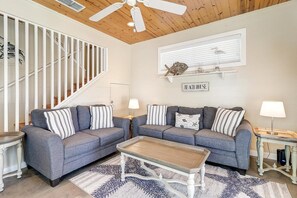 "Cozy up in our inviting living room, complete with cable TV for ultimate relaxation