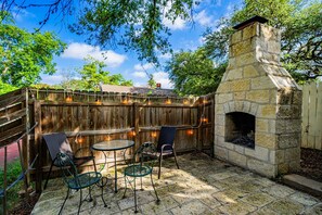 Fun outdoor space to cozy up to the fireplace.