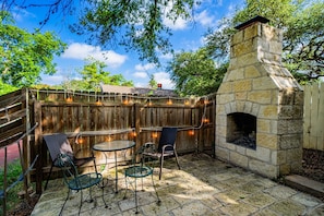 Fun outdoor space to cozy up to the fireplace.