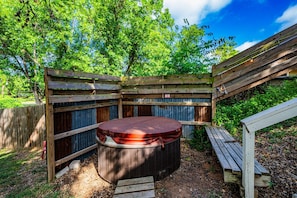 Unwind in the hot tub after a day on the town.