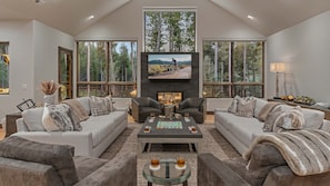 Gorgeous, modern great room with a see-through fireplace!