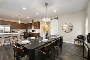 Kitchen and Dining Area w/ Fireplace | Comfortably seats 10!