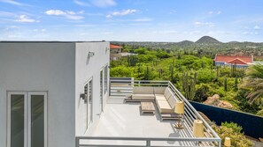 Phenomenal balcony retreat with Amazing views - Cozy outdoor retreat with seating Ample space for enjoying fresh air and sunshine Private oasis with a sense of tranquility